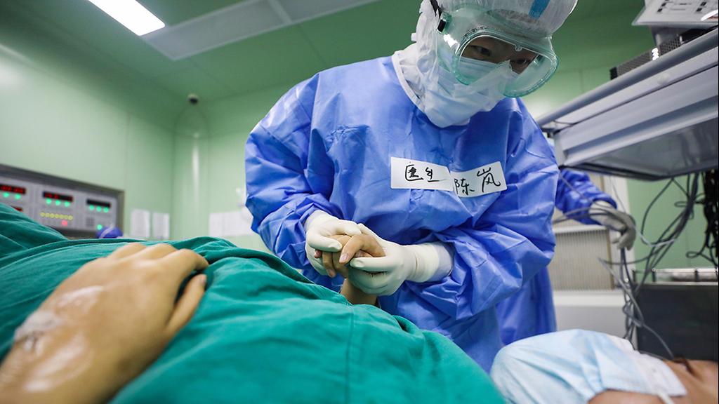 ווהאן סין מוקד התפרצות קורונה הקורונה נגיף רופא רופאים