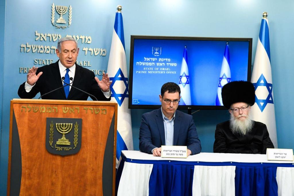Prime Minister Benjamin Netanyahu, Health Ministry DG Moshe Bar-Siman-Tov and Health Minister Yaakov Litzman make televised statements during the coronavirus lockdown 