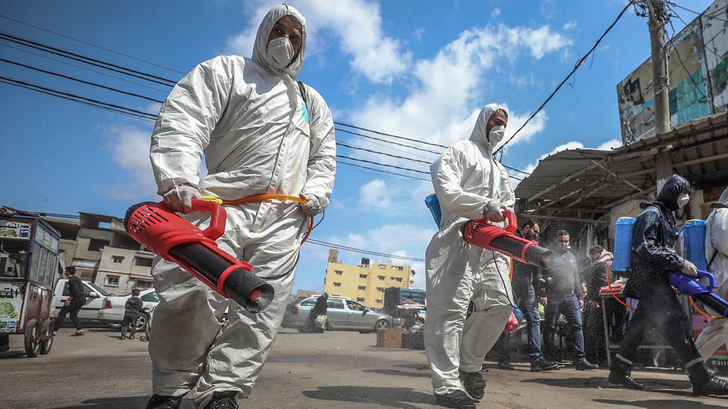  Hamas people sanitize the streets of Gaza amid virus fears 