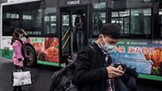 נגיף קורונה מחוז חוביי יורדים מאוטובוס ב ווהאן חוזרים לשגרה