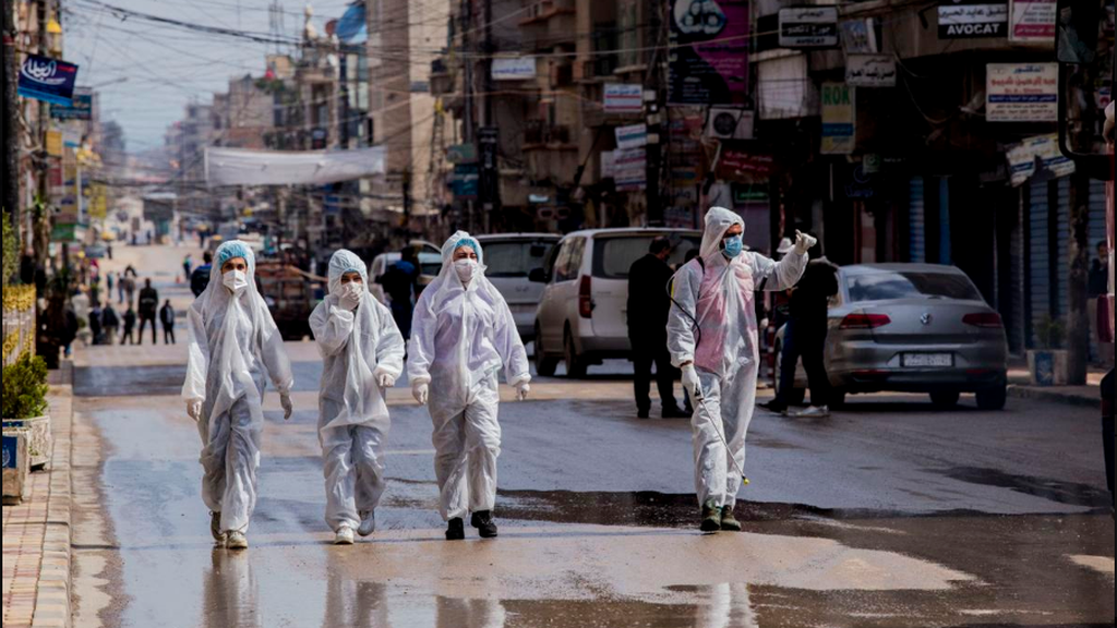 Medical workers oversee disinfection in Damascus, Syria 