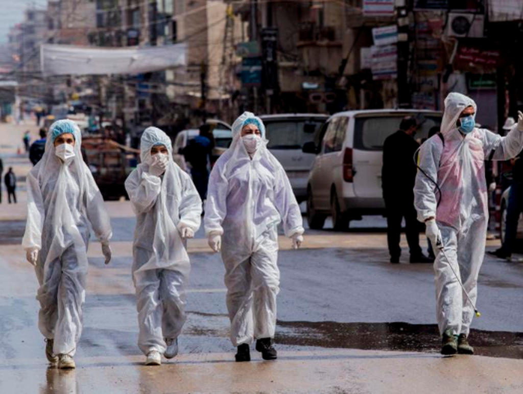 Medical workers oversee disinfection in Damascus, Syria 