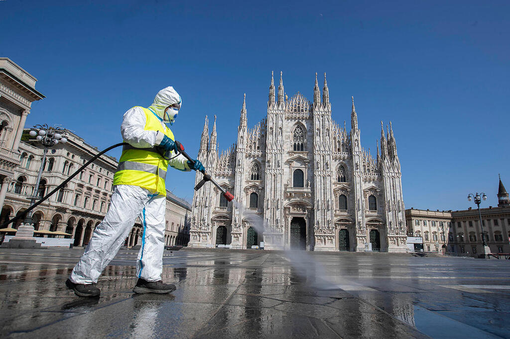 Disinfecting the plaza at Milan Cathedral, March 2020 
