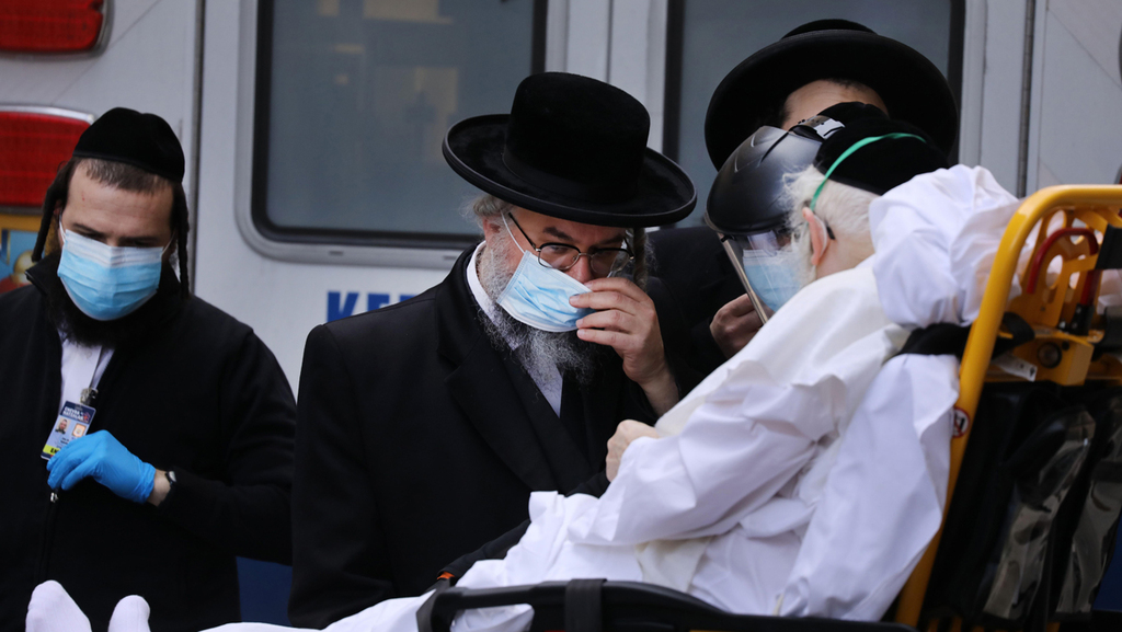 An elderly Haredi man afflicted with COVID-19 is brought to Mount Sinai Hospital in New York 