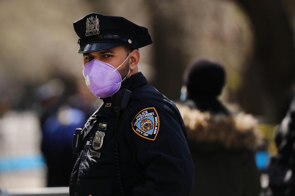 New York police officer wearing surgical protective mask 