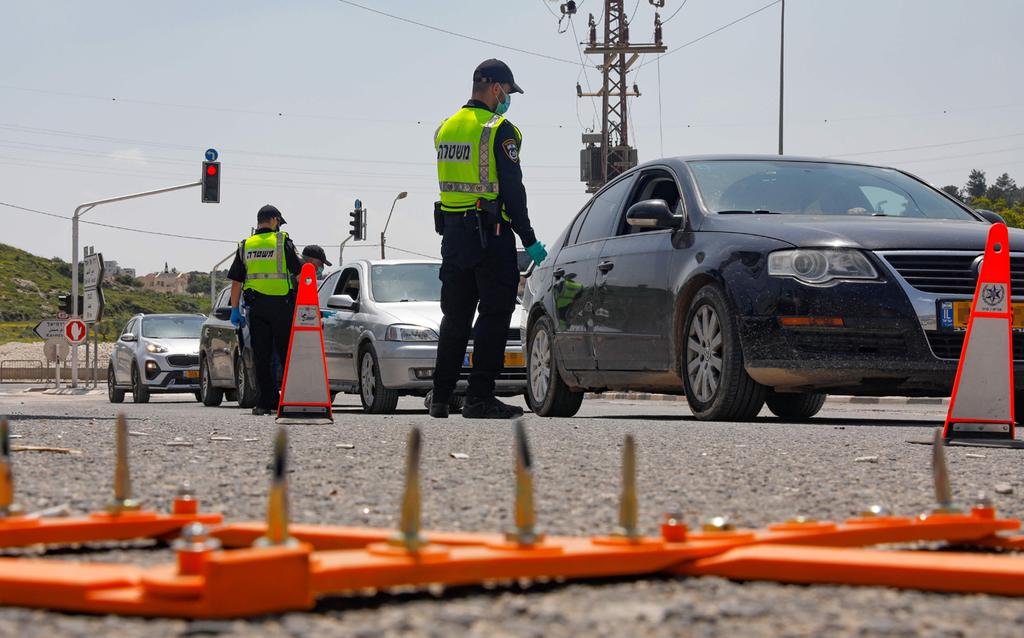 A police checkpoint in the virus-battered town of Deir al-Asad in northern Israel during lockdown 