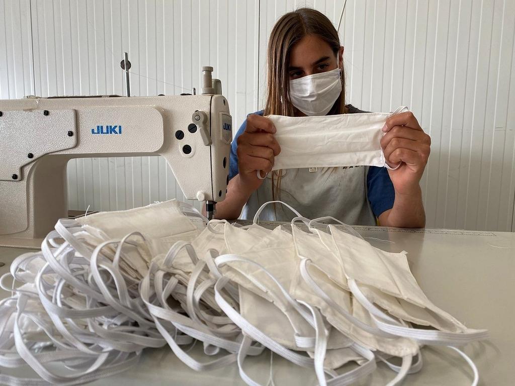 Production of reusable masks at Tzuba