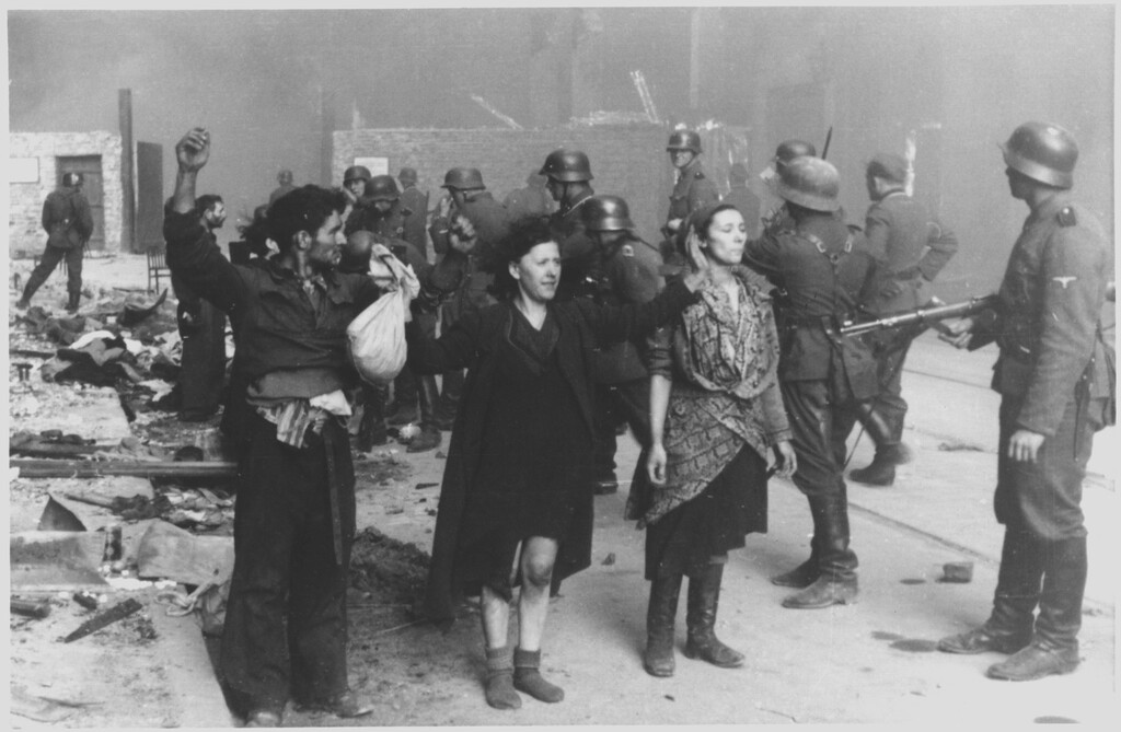 Nazi troops capture members of the Warsaw Ghetto resistance,  1943 