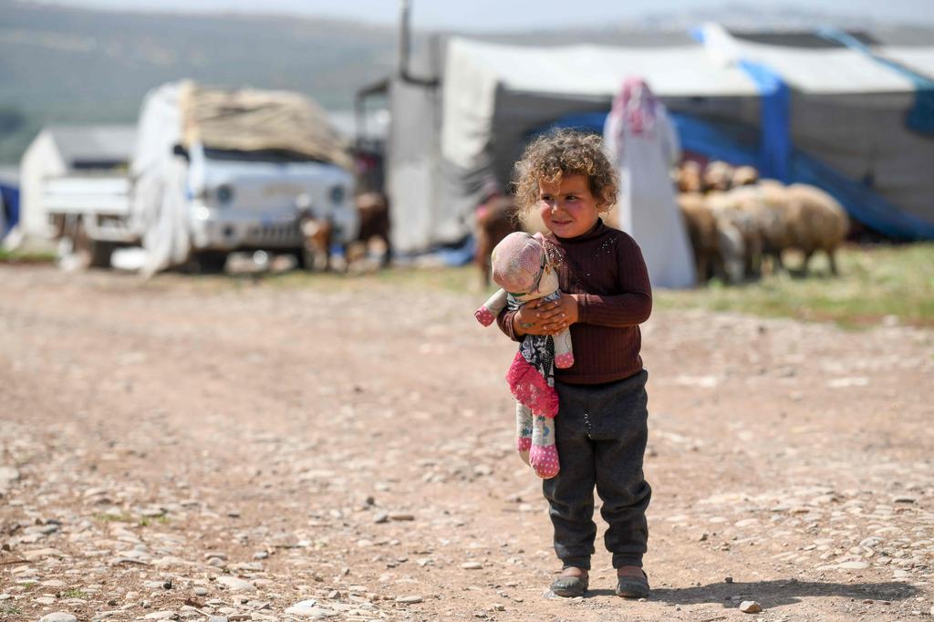 Syrian girl at displaced Syrian refugee camp near Turkish border