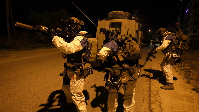 Police anti-terror unit forces near Tulkarem on the West Bank 
