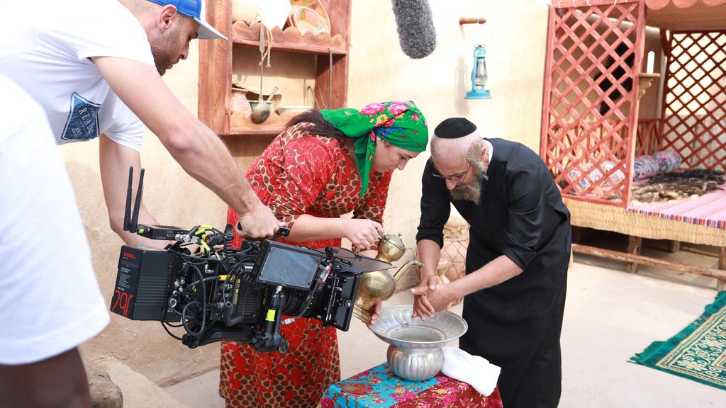 Iraqi actor Alla'a Shaker (L) and Saudi actor Abdulmohsin Al Nimir (R) are seen at a shooting set during filming of MBC's ramadan Arabic series 'Umm Haroun' in Dubai 