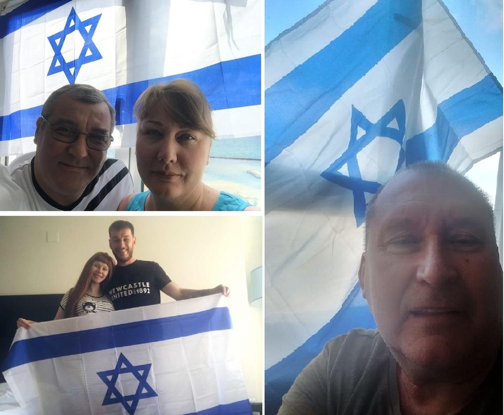 Репатрианты из Киева с флагами Израиля. Фото: селфи, предоставленное Сохнутом