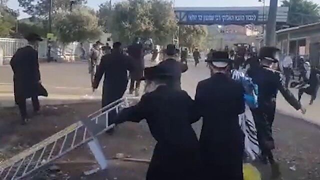 Altercations between Police and ultra-Orthodox workshippers at Mount Meron  