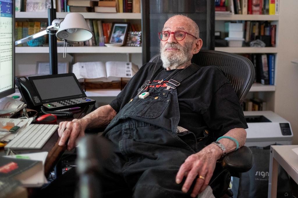 Larry Kramer poses for a portrait in his apartment in New York 