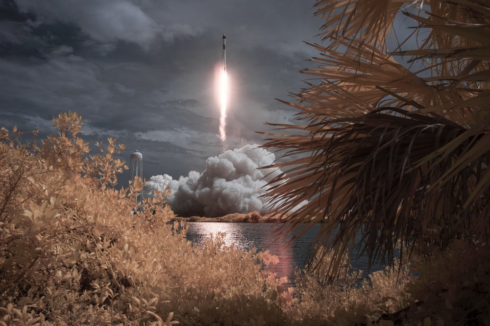  SpaceX Falcon 9 rocket carrying the company's Crew Dragon spacecraft is seen in this false color infrared exposure as it is launched on NASA's SpaceX Demo-2 mission to the International Space Station with NASA astronauts Robert Behnken and Douglas Hurley onboard 