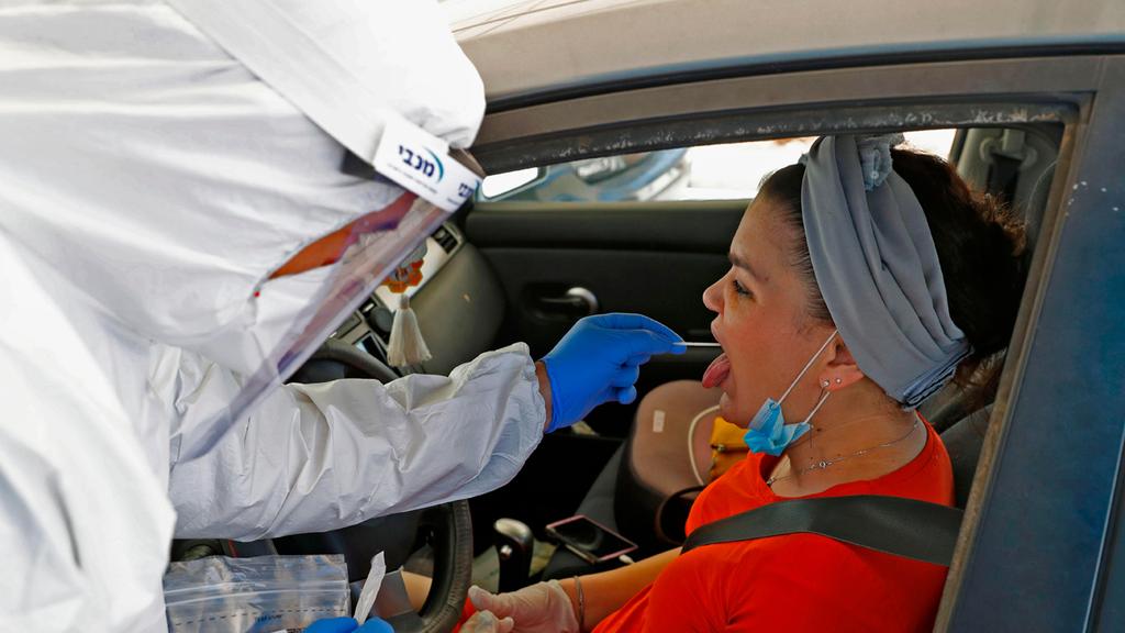 Testing for coronavirus north of Tel Aviv (Photo: AFP ) Testing for coronavirus north of Tel Aviv