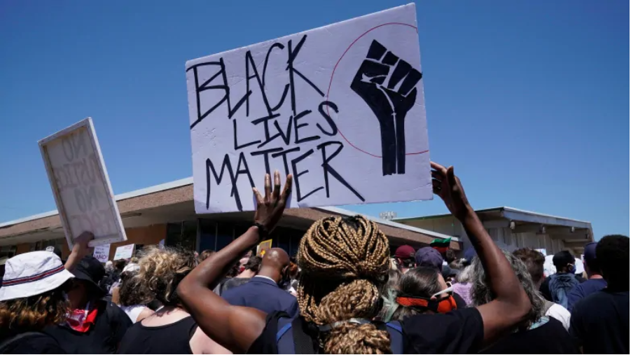 People in Oklahoma City, Okla., take part in a Black Lives Matter protest during nationwide unrest following the death of George Floyd in Minneapolis 