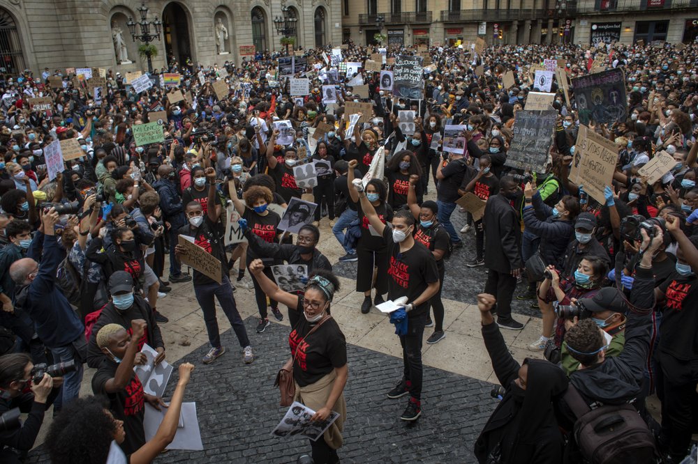 People gather in Barcelona, Spain, during a demonstration over the death of George Floyd 
