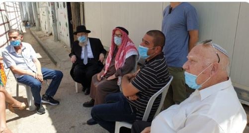 J'lm Chief Rabbi Stern visits family of Iyad Halaq shot dead by police 