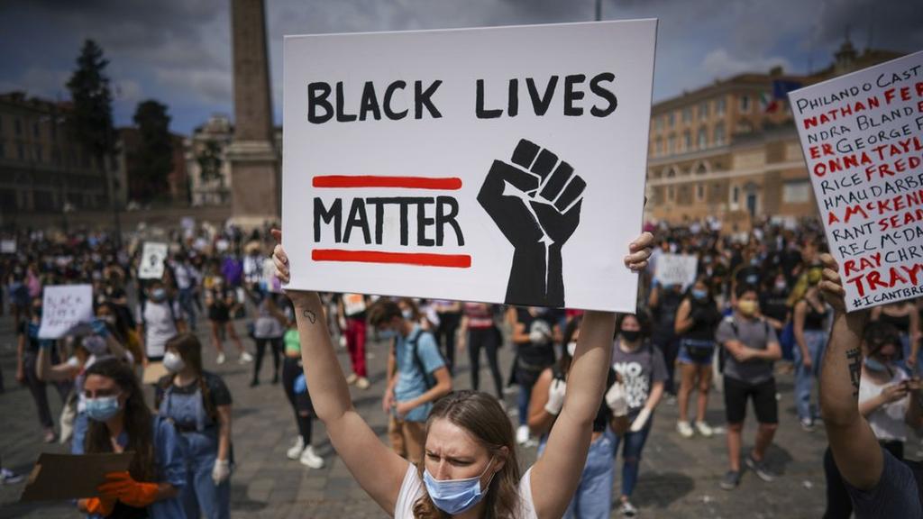 People gather calling for justice for George Floyd, who died May 25 after being restrained by police in Minneapolis, USA, in Rome's Piazza del Popolo square 