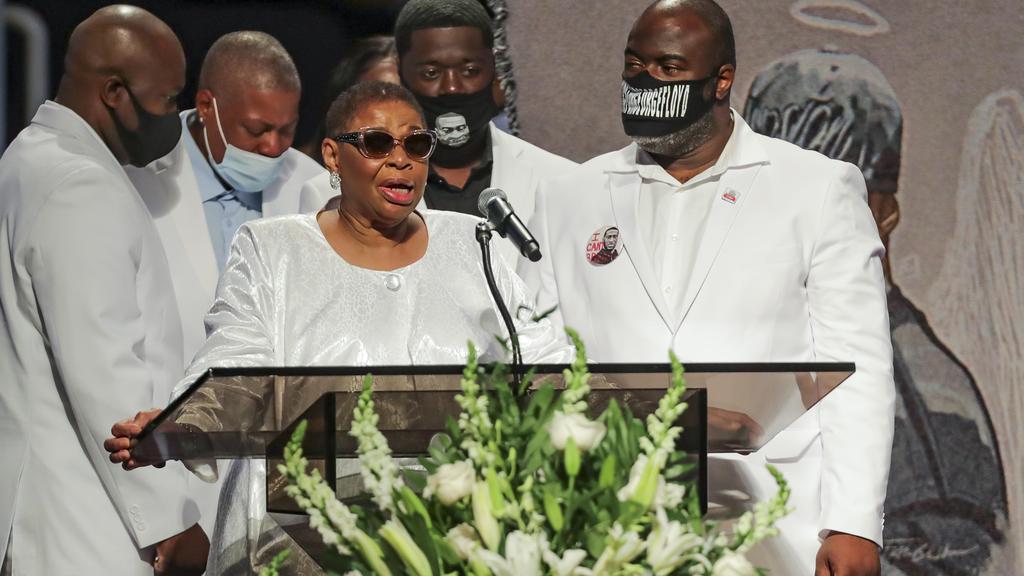 The family of of George Floyd comes to the podium to speak during the funeral for George Floyd on Tuesday, June 9, 2020 
