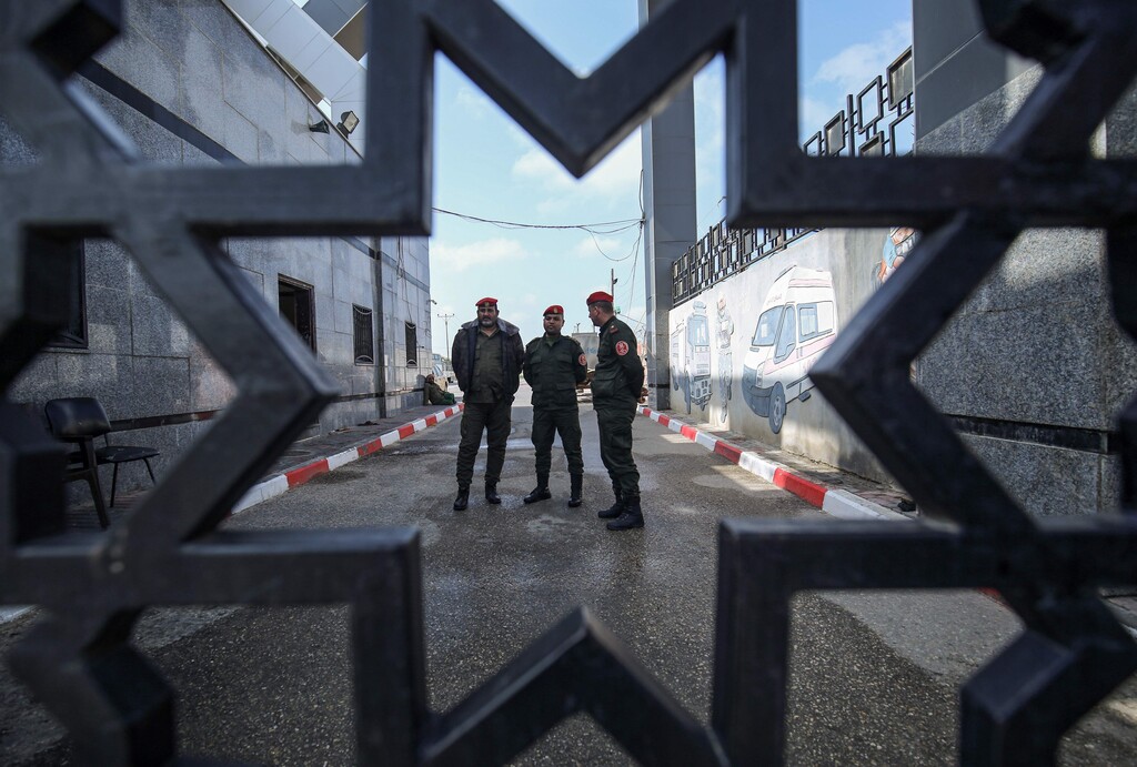 Palestinian security forces loyal to Hamas stand at the Rafah border crossing with Egypt in the southern Gaza Strip 