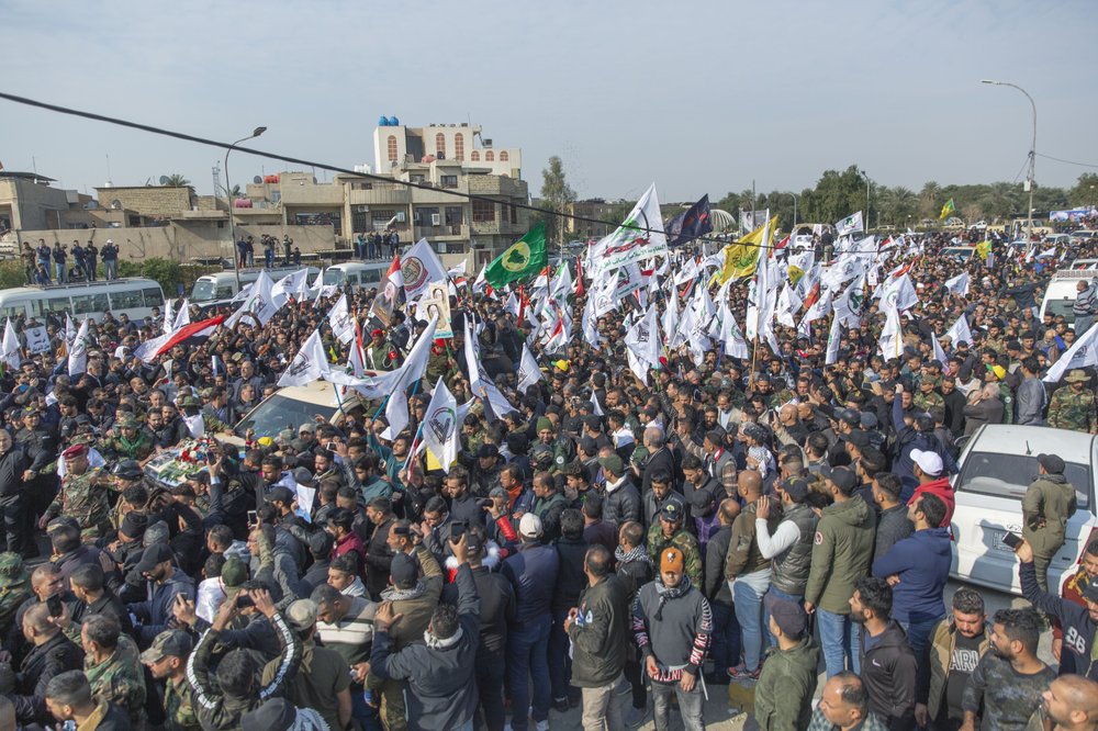 Mourners march during the funeral of Iran's top general Qassem Soleimani, and Abu Mahdi al-Muhandis, deputy commander of Iran-backed militias in Iraq known as the Popular Mobilization Forces and fellow militant leaders, in Baghdad, Iraq 