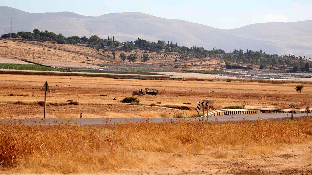 The Jordan Valley (Photo: AFP) בקעת הירדן ברקע מושב בקעות
