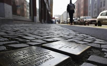 Rosa-Luxemburg Street in Berlin is paved with 'Stolpersteine' to remember the victims of the Holocaust 