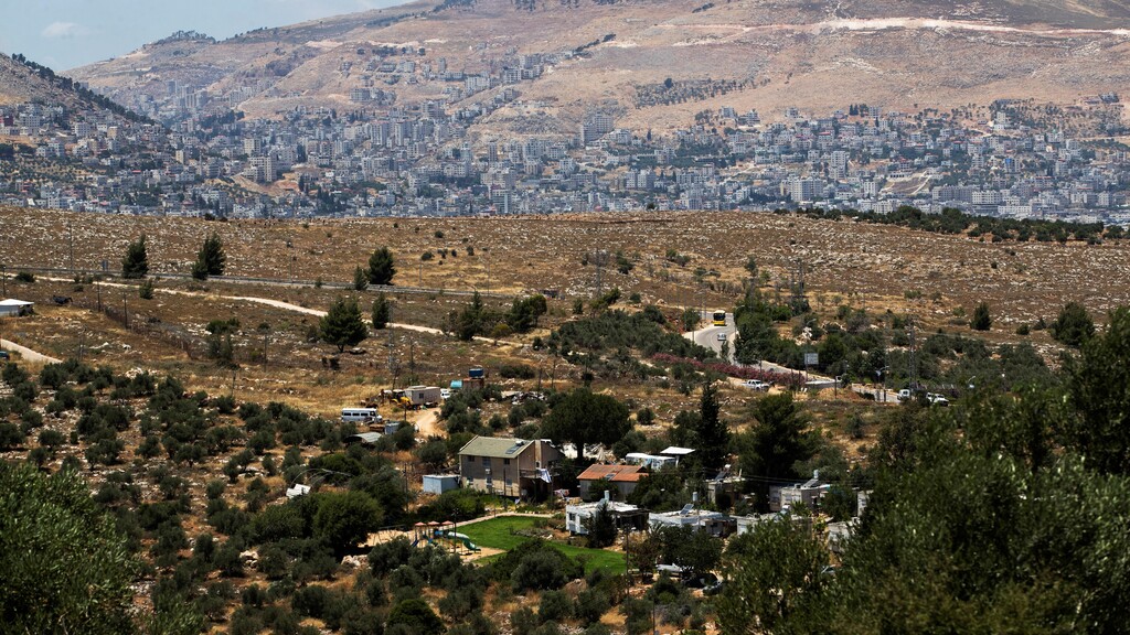 The West Bank settlement of Itamar, with Nablus in the background 