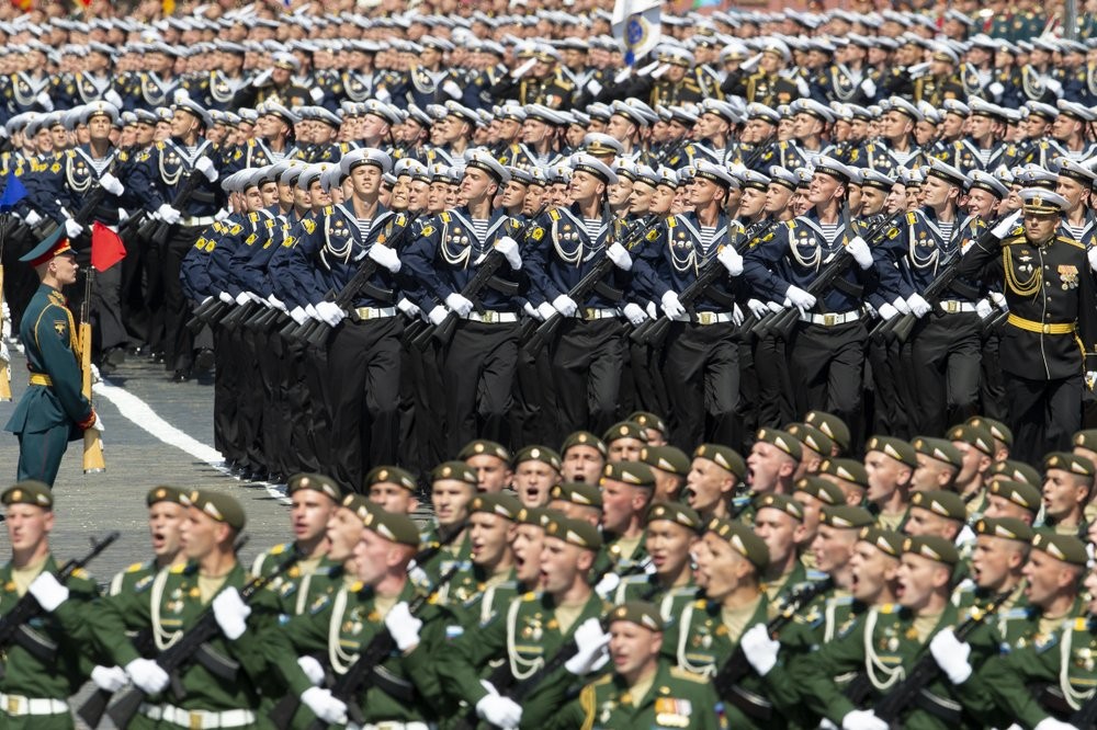 Russian sailors, center, march in Red Square during the Victory Day military parade marking the 75th anniversary of the Nazi defeat in WWII in Moscow, Russia 