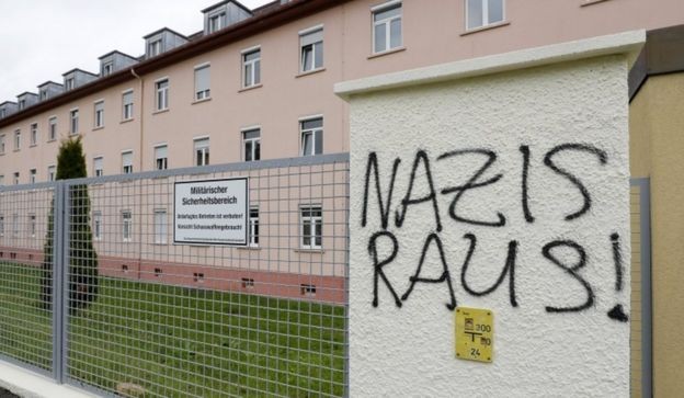 Graffiti reading "Nazis out!" on a fence at the Fürstenberg barracks in Donaueschingen 