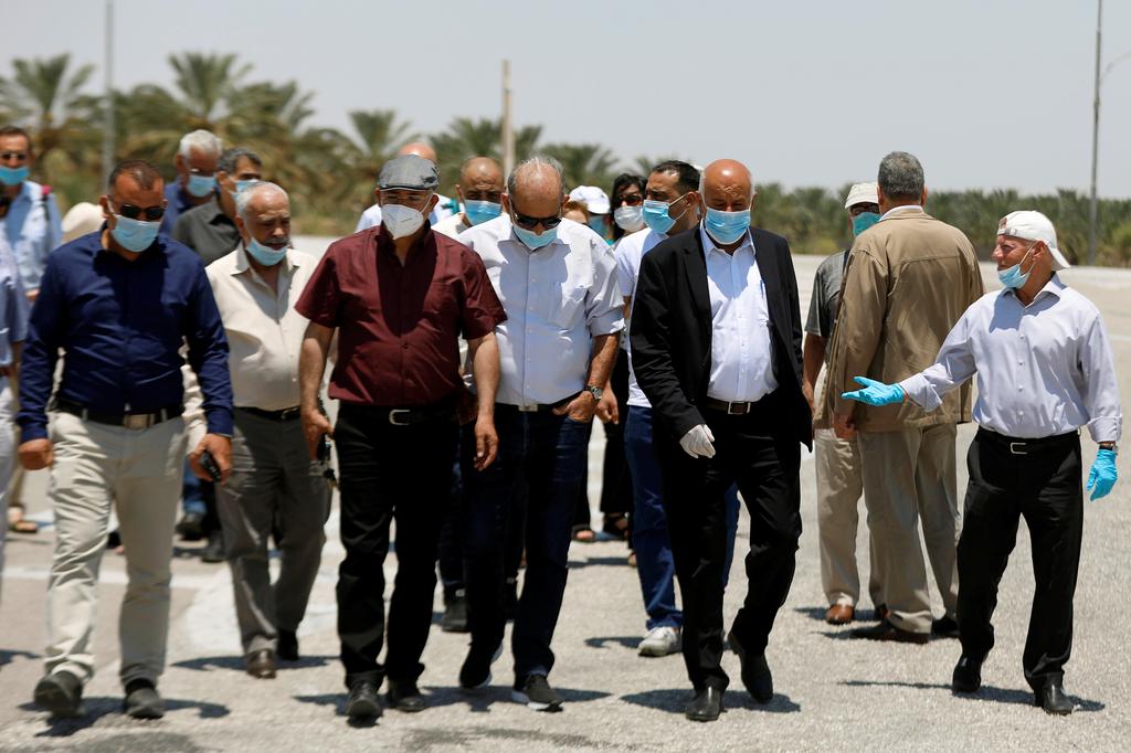 Fatah official Jibril Rajoub and Palestinian activists protest near Jericho against Israel's plan to annex parts of the West Bank, July 1, 2020 