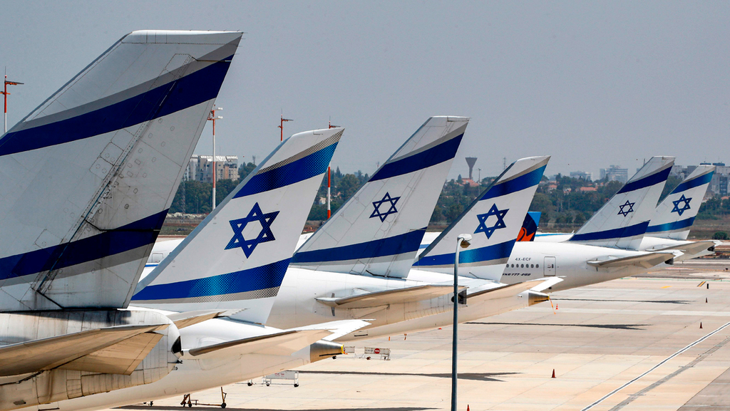 Planes belonging to Israeli national carrier El Al are parked at Ben-Gurion Airport in July after a suspension of international flights 