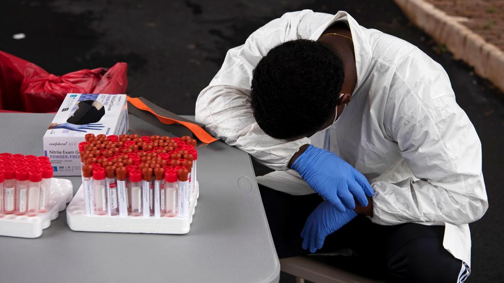 An exhausted worker at coronavirus testing center in Texas 