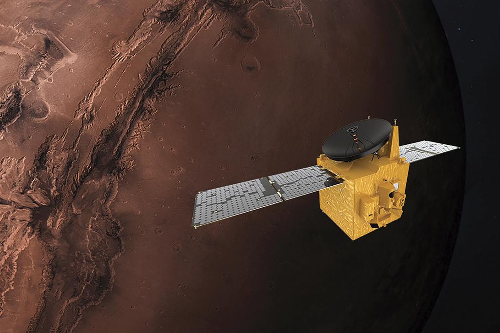  This June 1, 2020, file rendering provided by Mohammed Bin Rashid Space Centre shows the "Amal"probe over Mars
