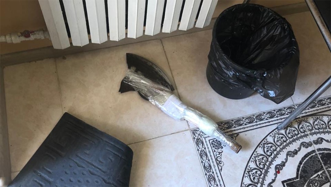 An ax taken from an intruder by a security guard at the synagogue of Mariupol, Ukraine