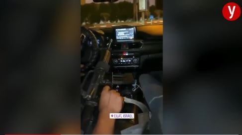 The video showing the driver with an M16