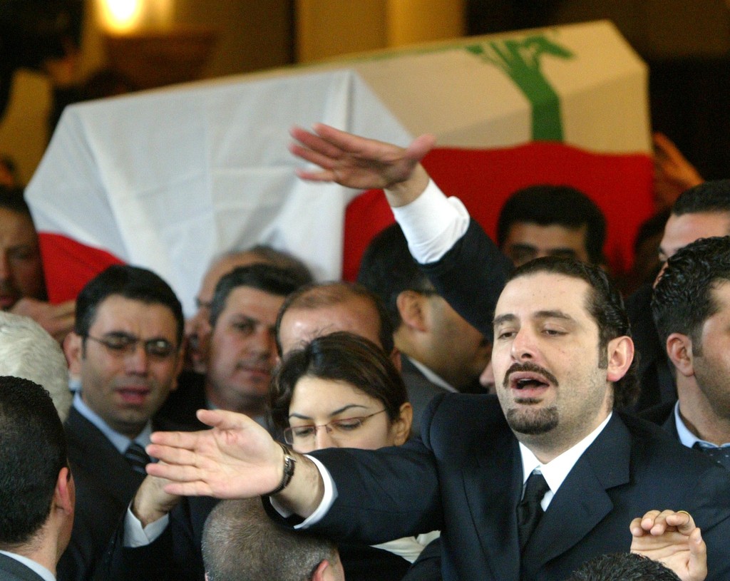 Saad ed-Dine al-Hariri, son of former Lebanese prime minister Rafik al-Hariri, gestures in front of his father's coffin in Beirut, Lebanon, February 16, 2005 