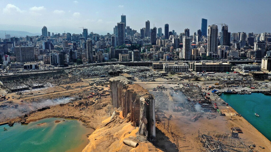 An aerial view shows the massive damage done to Beirut port's grain silos