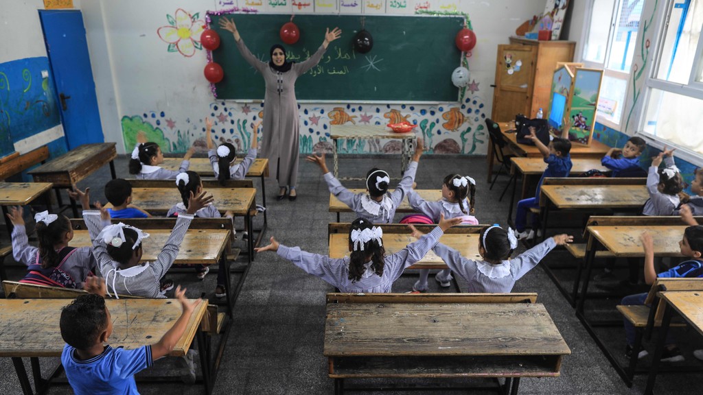 Palestinian students attend a class at a school run by The United Nations Relief and Works Agency (UNRWA) in Jabalia refugee camp in northern Gaza Strip 