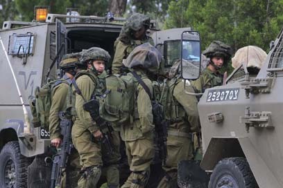 IDF troops at the scene of the 2010 attack  
