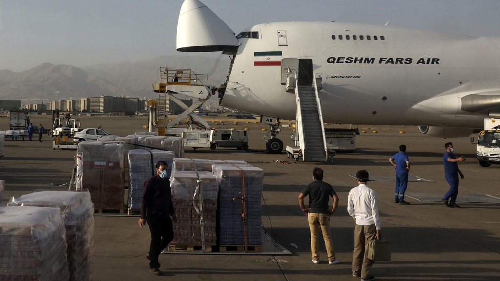 Aid supplies sit on the tarmac at Tehran airport before being loaded on a plane bound for Beirut on August 5, 2020 