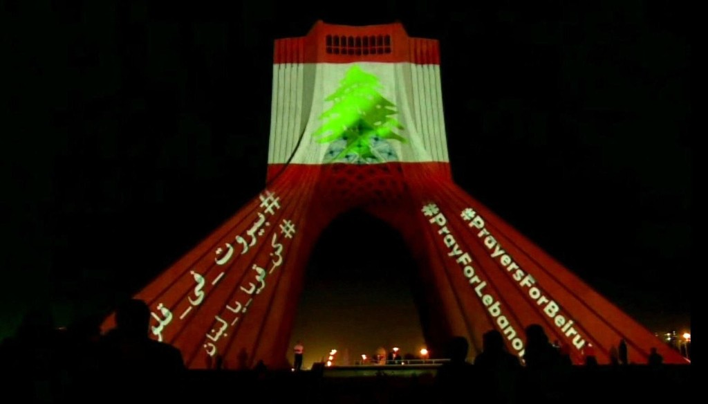 Iran's Azadi Tower is lit up with the Lebanese flag a day after the devastating blast at Beirut port  