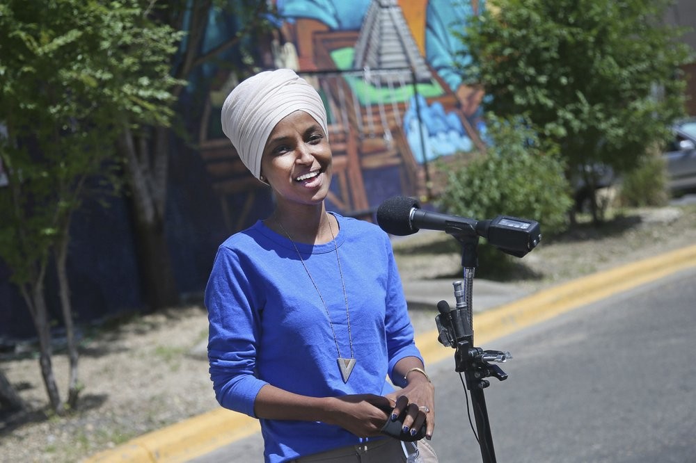 Democrat Rep. Ilhan Omar addresses media after lunch at the Mercado Central in Minneapolis 