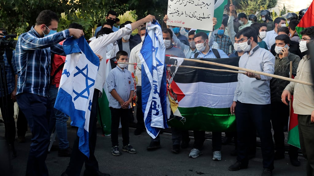  Protesters in Iran burn Israeli flag 