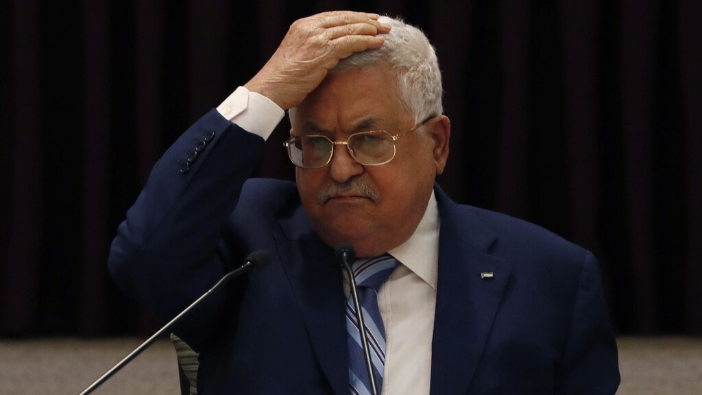 President Mahmoud Abbas gestures during a meeting with the Palestinian leadership