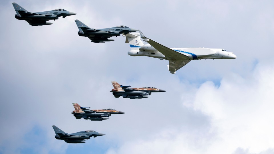 German air force Bundeswehr Eurofighters and an Israeli Air Force jets fly in formation over the Fuerstenfeldbruck airbase in commemoration of the 1972 Olympic Games