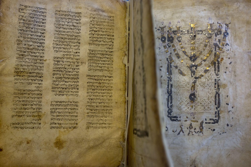 A library official shows a Jewish manuscript smuggled into Israel from Damascus in a Mossad spy operation in the early 1990s