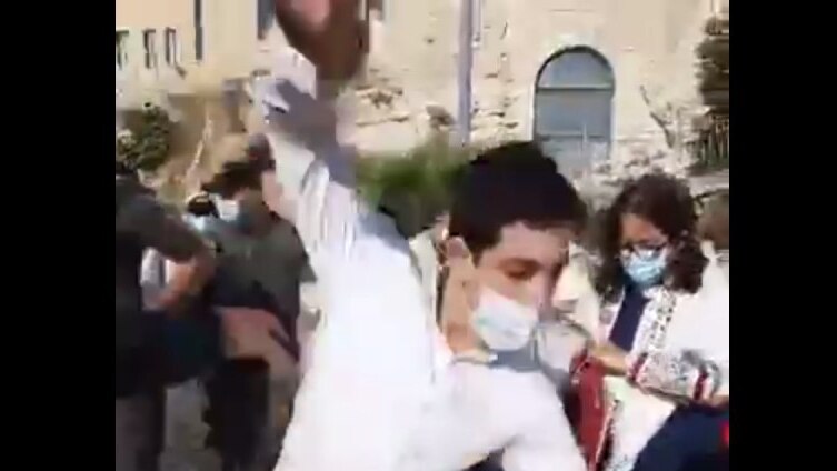   A Haredi man attacking members of the Women of the Wall, August 2020 